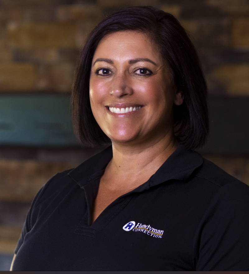 Picture of a woman wearing a black polo